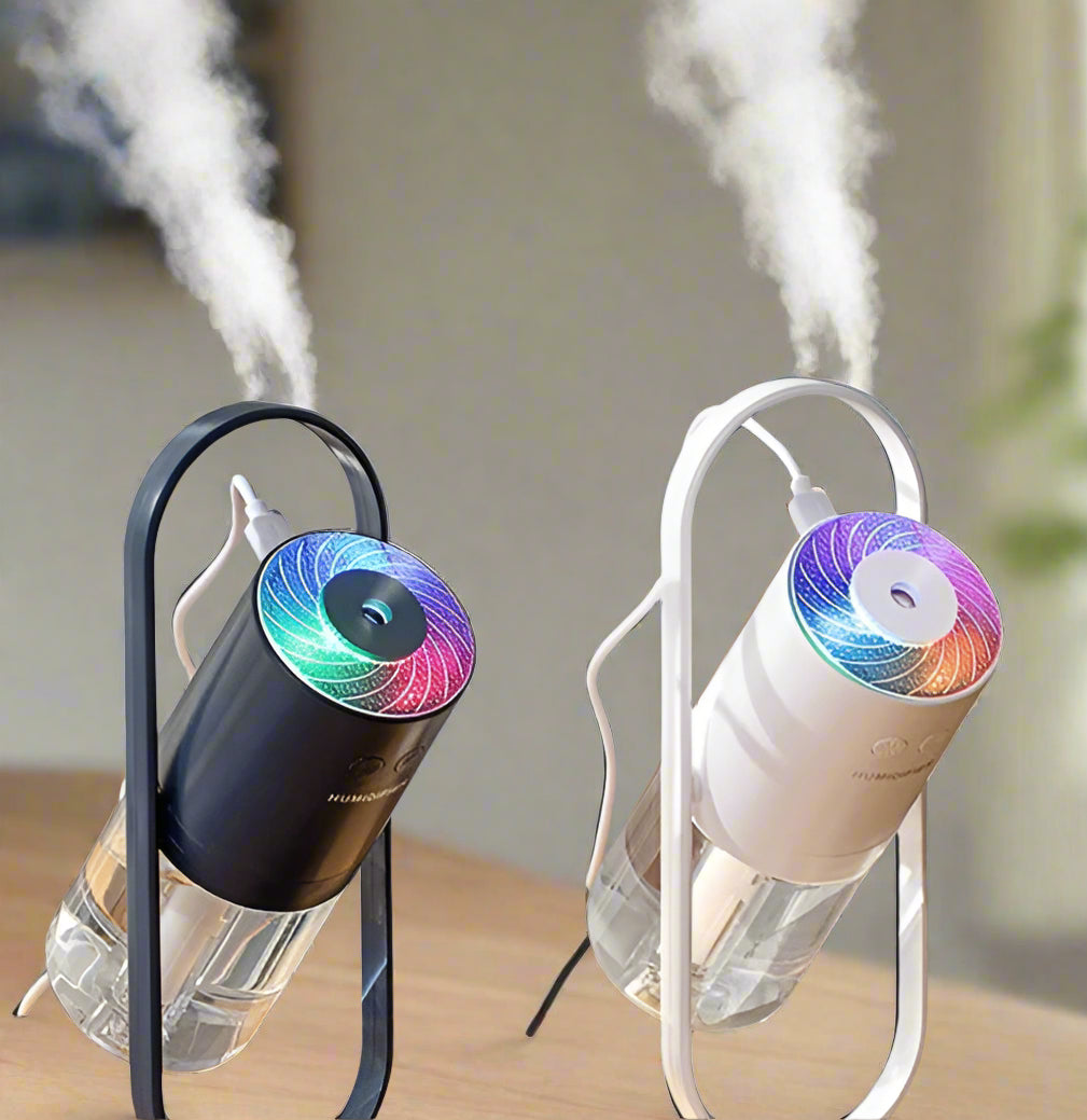 Two humidifiers emitting mist with text about healthy living and moisturizing.